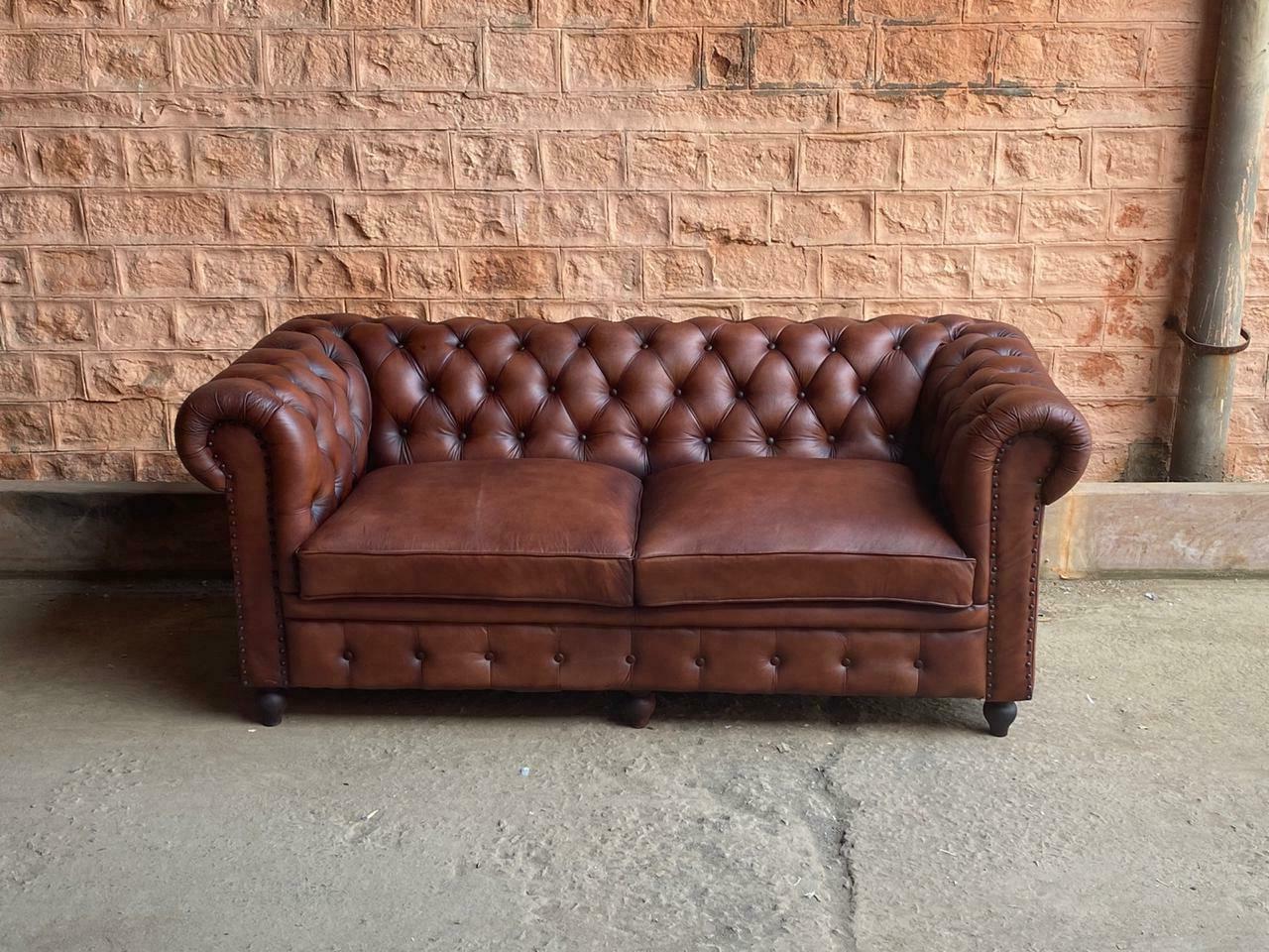 divano chester pelle etnico legno design vintage