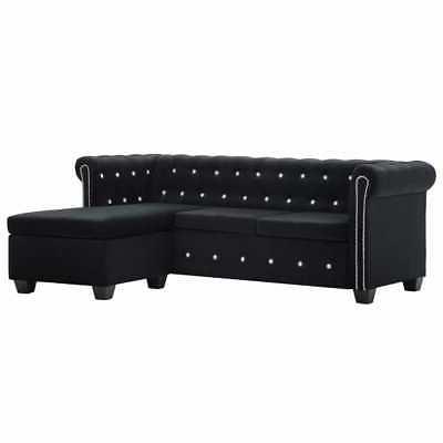 divano chesterfield a forma di l in