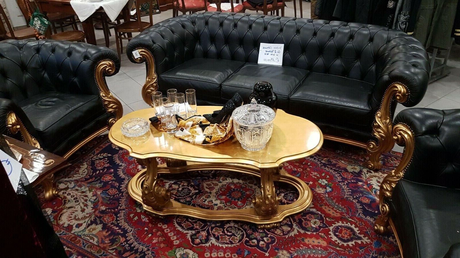 divano con poltrone in pelle