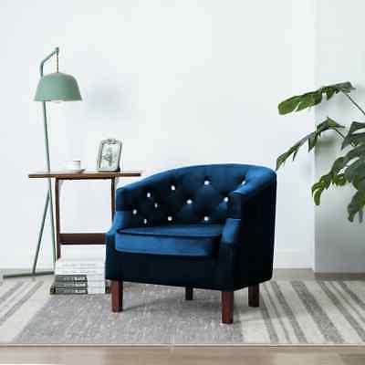 poltrona con rivestimento in velluto blu capitonne