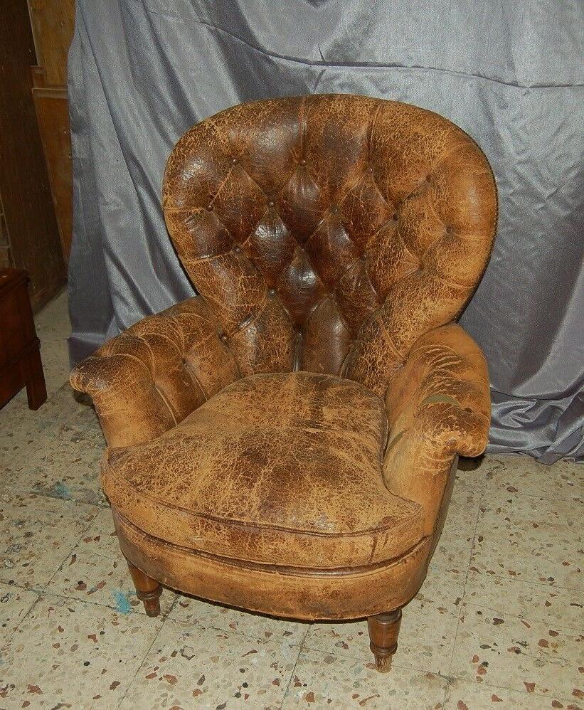 poltrona in pelle a capitonne vintage