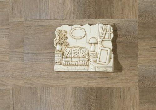 quadro sagomato piccolo ceramica avorio decoro divano